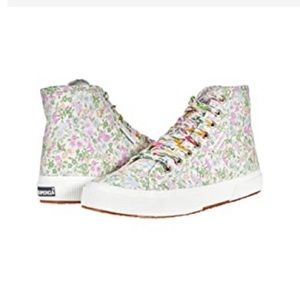 LoveShackFancy X Superga high top canvas sneakers with floral print.